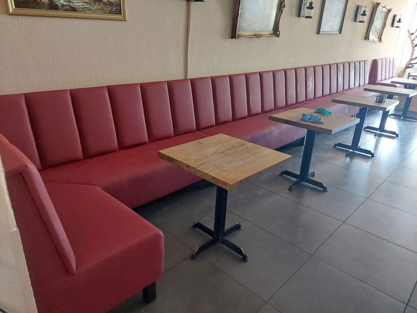 Red Long Couch with Dining Tables